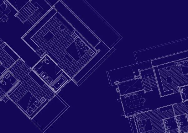 Blueprint floor plan showing the design phase of a custom home budget