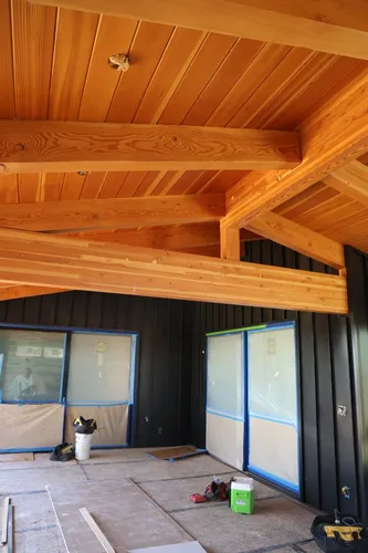 Cedar Porch Ceiling Beams — custom home by Open Prairie (Build Process · Behind the build)