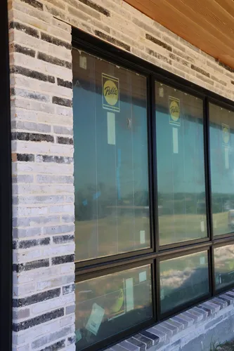 Exterior Brick Window Detail — custom home by Open Prairie (Build Process · Behind the build)