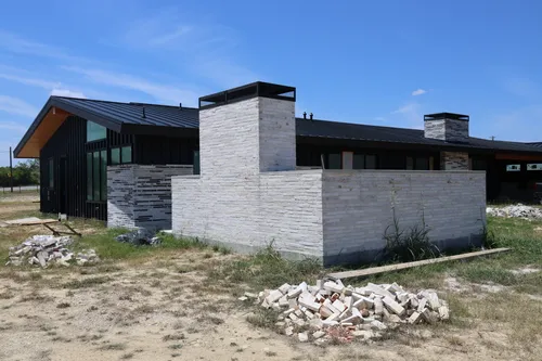 Exterior Metal Roof Siding — custom home by Open Prairie (Build Process · Behind the build)