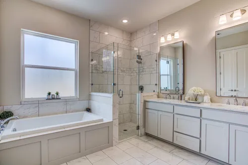 Master Bath Tub Shower Vanity — custom home by Open Prairie (The Residence · Fort Worth)