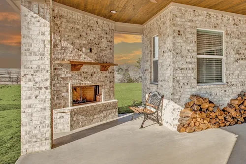 Covered Patio Outdoor Fireplace — custom home by Open Prairie (Other Builds · Selected work)