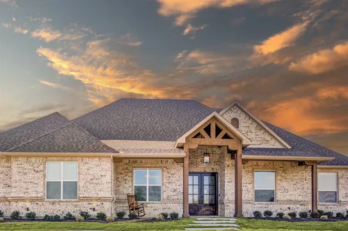 Exterior White Brick Sunset — custom home by Open Prairie (Other Builds · Selected work)