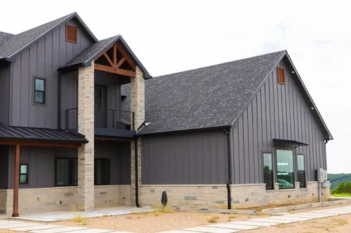 Exterior Front Barndominium Wing — custom home by Open Prairie (The Barndominium · Graford)