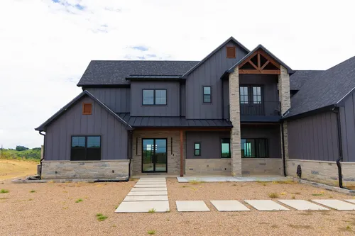 Exterior Front Entry Angle — custom home by Open Prairie (The Barndominium · Graford)