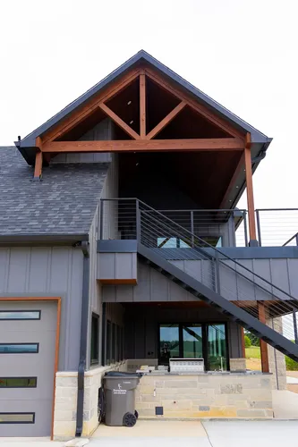 Exterior Gable Truss Staircase — custom home by Open Prairie (The Barndominium · Graford)