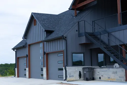 Exterior Garage Doors — custom home by Open Prairie (The Barndominium · Graford)