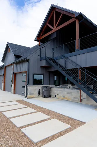 Exterior Side Staircase Pathway — custom home by Open Prairie (The Barndominium · Graford)