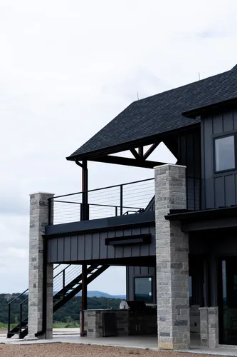 Upper Deck Staircase — custom home by Open Prairie (The Barndominium · Graford)