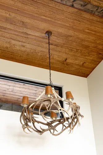 Antler Chandelier Wood Ceiling — custom home by Open Prairie (The Estate · Graford)