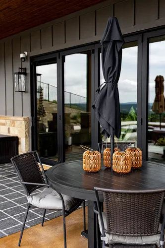 Back Patio Dining Table View — custom home by Open Prairie (The Estate · Graford)