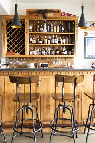 Basement Bar Wood Stools — custom home by Open Prairie (The Estate · Graford)