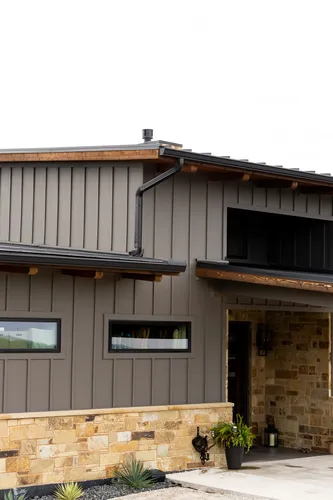 Exterior Front Roofline Entry — custom home by Open Prairie (The Estate · Graford)