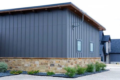 Exterior Side Metal Siding Landscaping — custom home by Open Prairie (The Estate · Graford)
