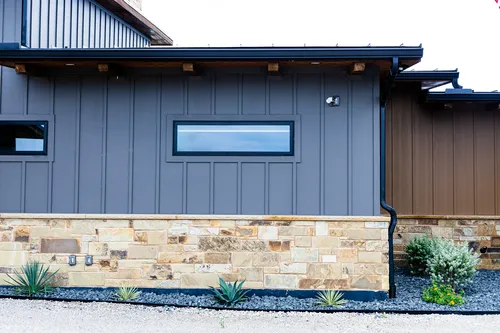 Exterior Side Stone Siding — custom home by Open Prairie (The Estate · Graford)