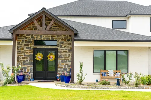 Exterior Front Entry — custom home by Open Prairie (The Lakehouse · Graford)