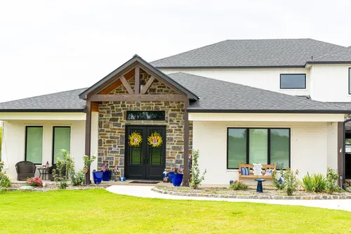 Exterior Front Wide — custom home by Open Prairie (The Lakehouse · Graford)