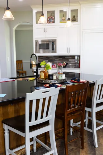 Kitchen Island Bar Seating — custom home by Open Prairie (The Lakehouse · Graford)