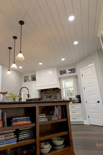 Kitchen Island Shiplap Ceiling — custom home by Open Prairie (The Lakehouse · Graford)