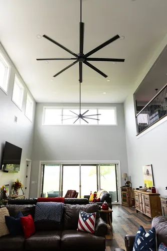 Living Room Two Story Front Door — custom home by Open Prairie (The Lakehouse · Graford)