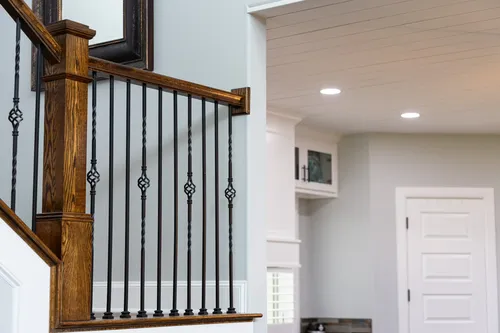 Staircase Baluster Entryway Detail — custom home by Open Prairie (The Lakehouse · Graford)