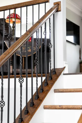 Staircase Iron Balusters — custom home by Open Prairie (The Lakehouse · Graford)